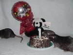The boys sampling chocolate ice cream cake.